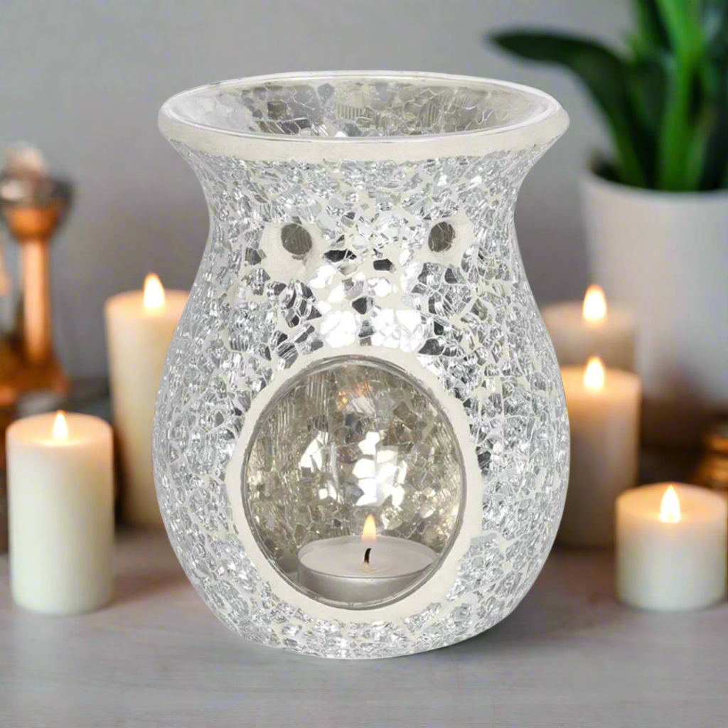 wax melt burner with candles in the background