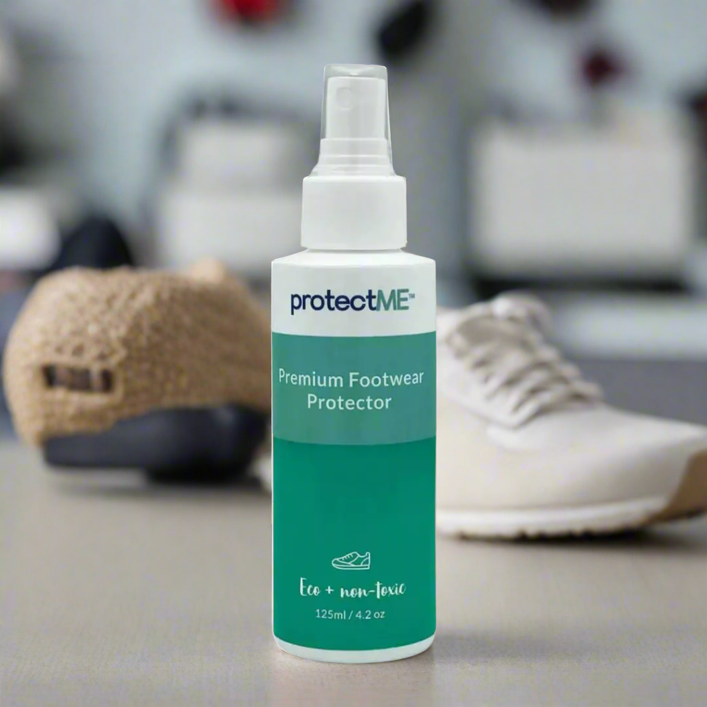 protecrtME shoe protector with shoes behind the bottle